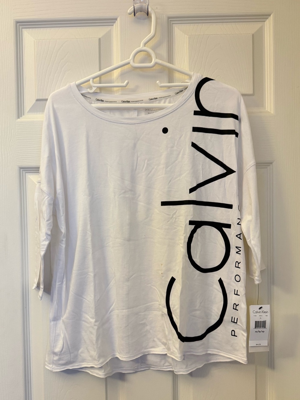 Calvin Klein White Long Sleeve Logo Tee with Black Vertical Script